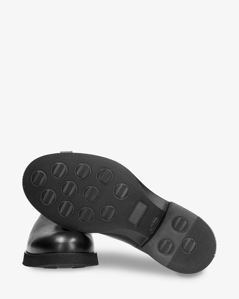 Edwin Igloo botines de piel con forro interior de pelo natural. negro