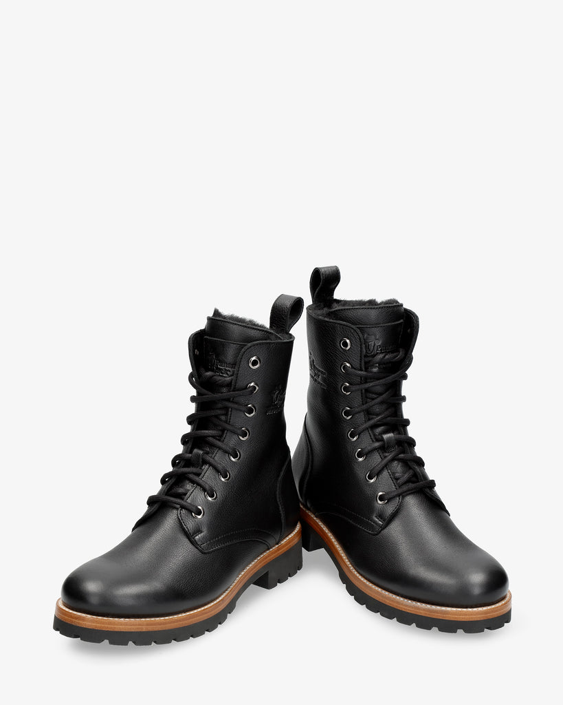 Frisia botas de piel con forro interior de pelo. negro