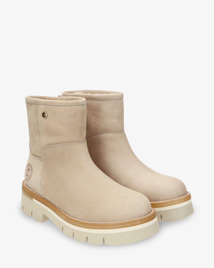 Laia botas de piel con forro interior de pelo. crudo