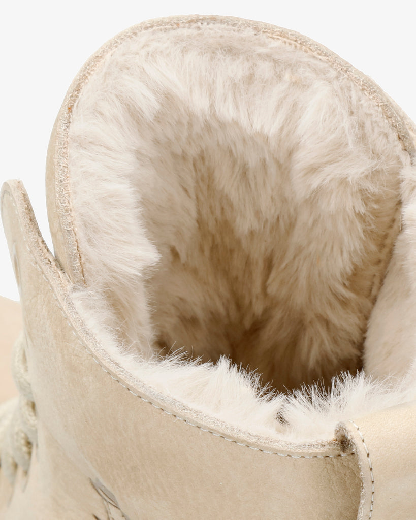 Padma botas de piel con forro interior de pelo. crudo