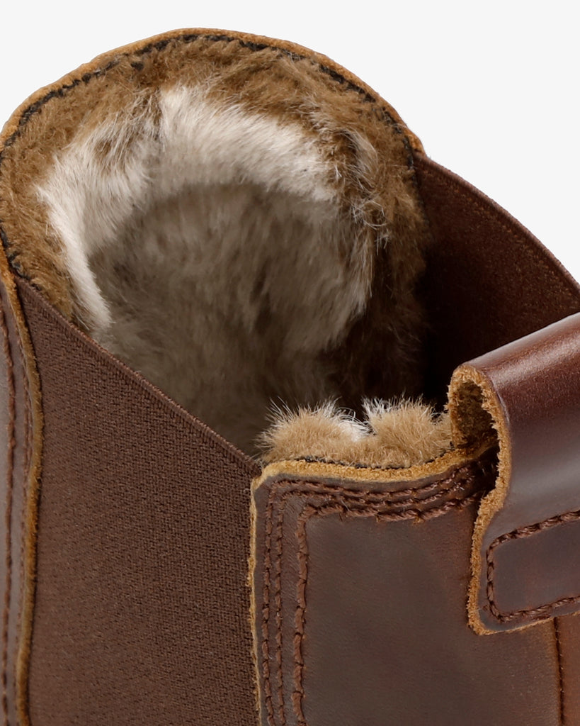 Pia botines de piel con forro interior de pelo. cuero