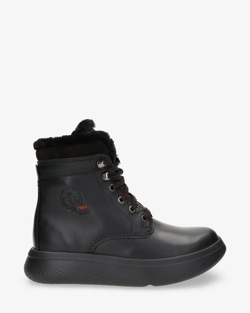 Yara Igloo botas de piel con forro interior de pelo natural. negro